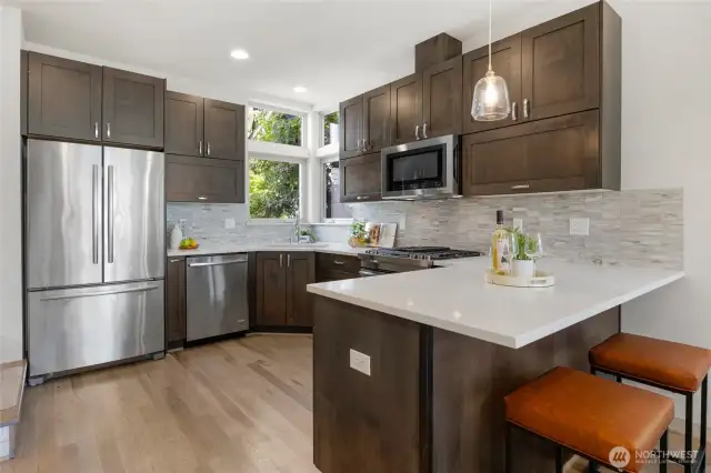 Keep an eye on the cook and a good place to entertain.