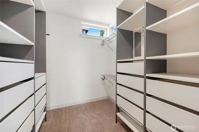 Excellent walk-in closet with added closet organizer system.  Some natural light from the window too.