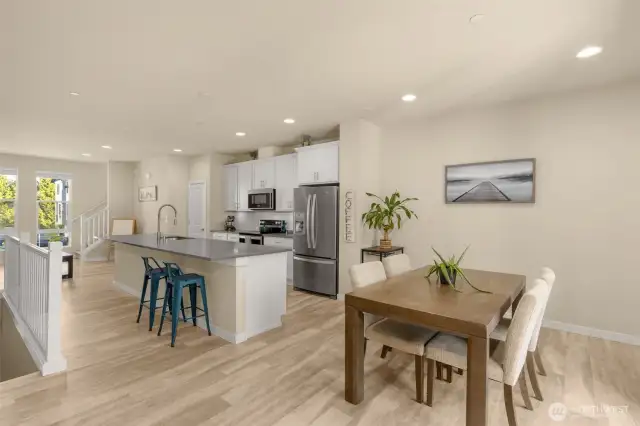 Dining room sits just off the kitchen, perfectly placed for easy meals and effortless entertaining, with seamless access to the patio for indoor-outdoor gatherings.
