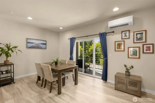 Dining room sits just off the kitchen, perfectly placed for easy meals and effortless entertaining, with seamless access to the patio for indoor-outdoor gatherings.