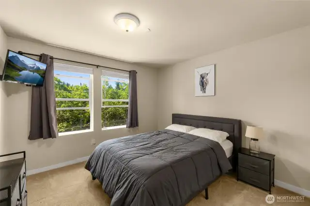 Bedroom on second level. One can also enjoy the calming symphony of frogs from this room as well.