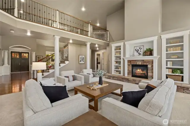 Gas fireplace surrounded by built-in shelves.