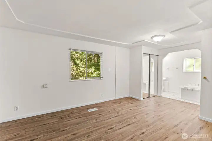Primary Bedroom with a .75 bathroom with just a tub.
