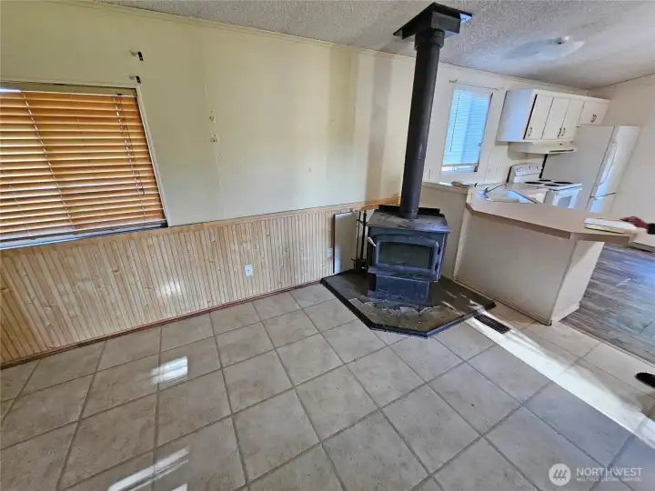 Woodstove in the living room but may not be certified. Can be removed if buyer doesnt want it.