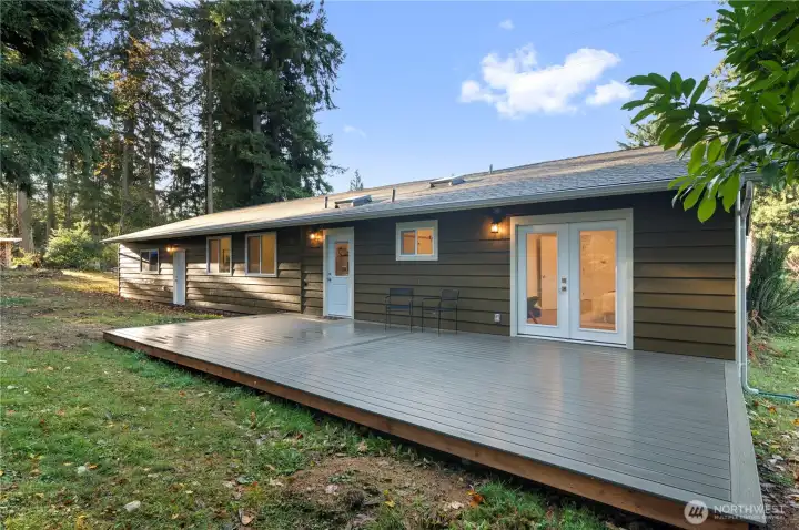 Massive back deck to enjoy your sprawling, park like 1.5 acres.
