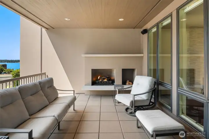 Covered patio off family room with gas fireplace