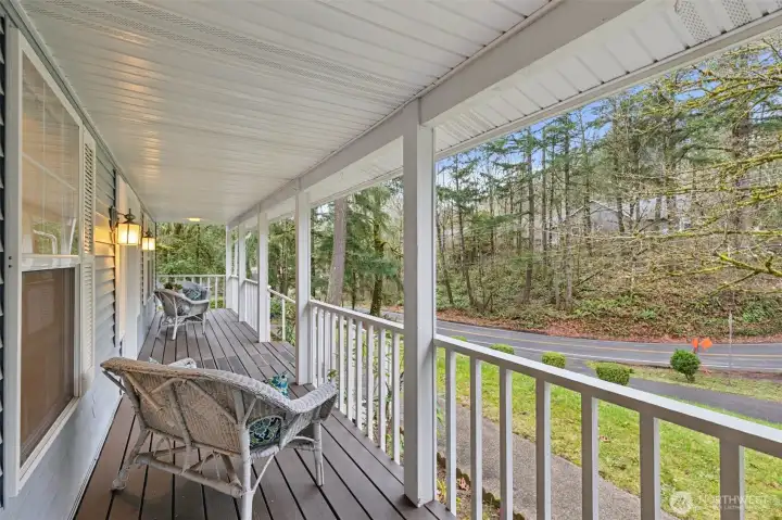 The welcoming front covered porch keeps company dry at the door, plus offers winter retreat and summer shade as you watch the world go by.