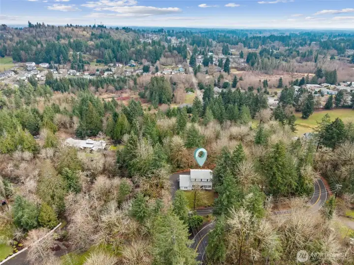 1 acre of woodlands surrounds the home with Sapp Rd leading south to Tumwater Hill, Tumwater Services like Costco and schools and I-5, Tumwater Valley and more. Head Northwest to Black Lake, SPSCC, 101, Westside.