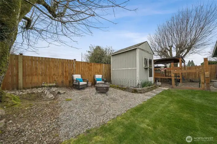 Storage shed, fire pit space