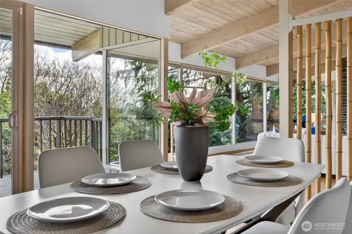 Windows look out to the natural green space and deck.  Be entertained by the hummingbirds, robins, and stellar jays from the windows and off your back deck.