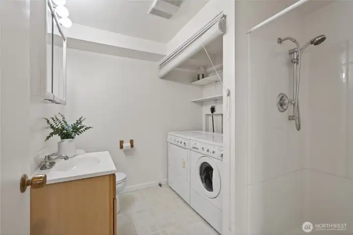 Lower level ¾ bath with laundry area.