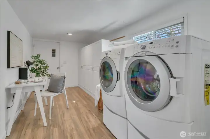 Generous utility room with access to oversized 700 sf attached garage
