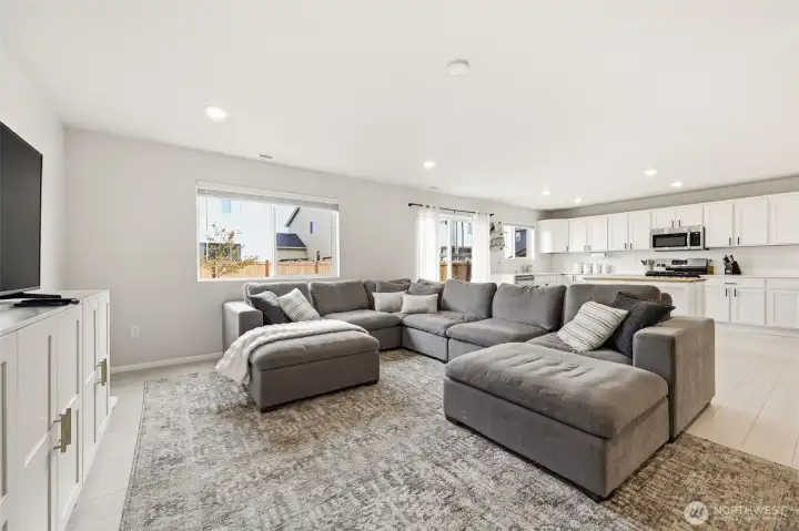 Living, dining, and kitchen all flow seamlessly.