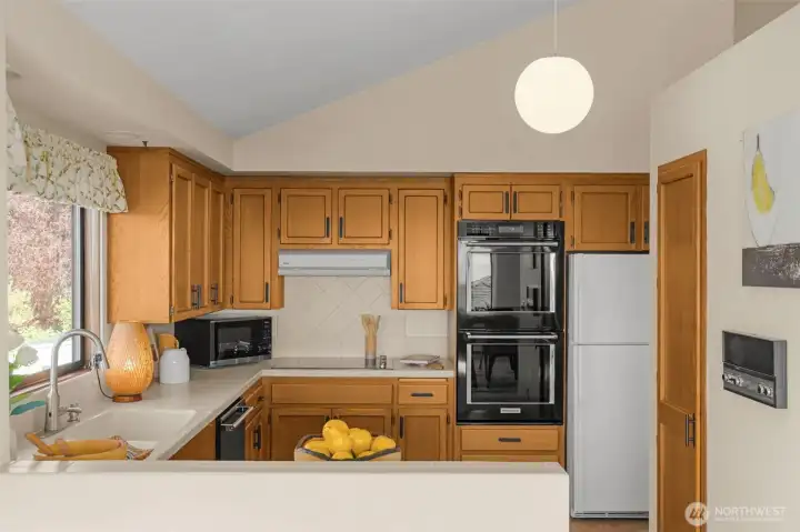 Plenty of upper & lower cabinets with a sought after pantry!