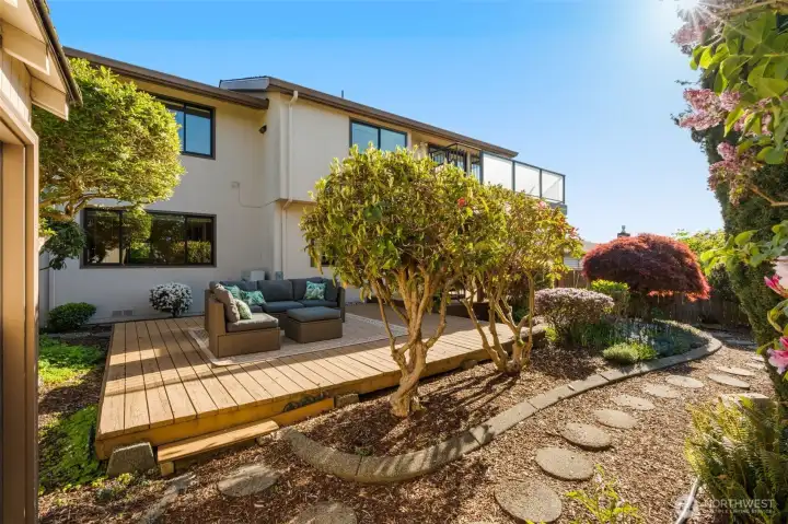 Looking at the house from the gorgeous backyard