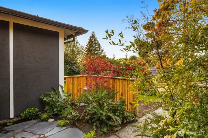 A private front courtyard welcomes you through an intoxicating Zen-inspired Asian garden and striking designer entrance door.