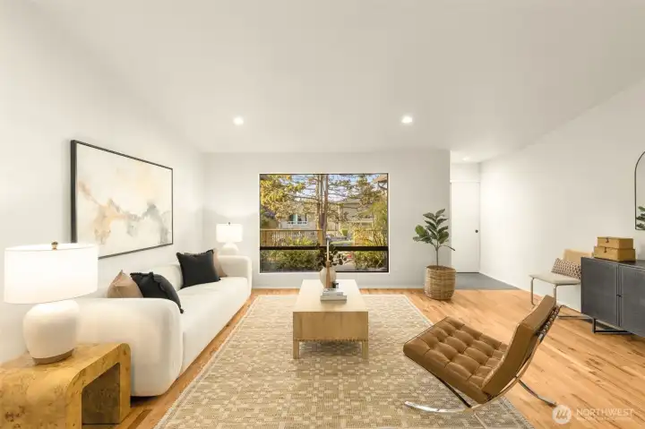Spacious living room, canned lights illuminates the room.