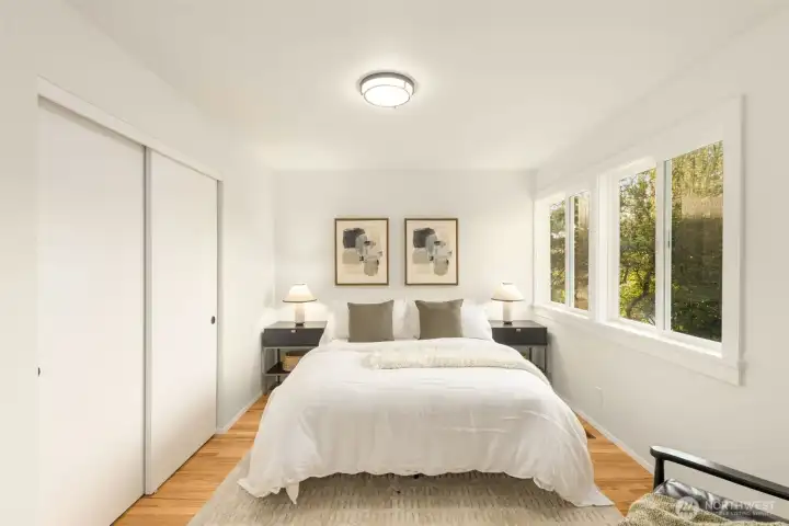 Relax in the luxurious primary suite with designer tile shower, sleek modern vanity, and 2 separate closets.