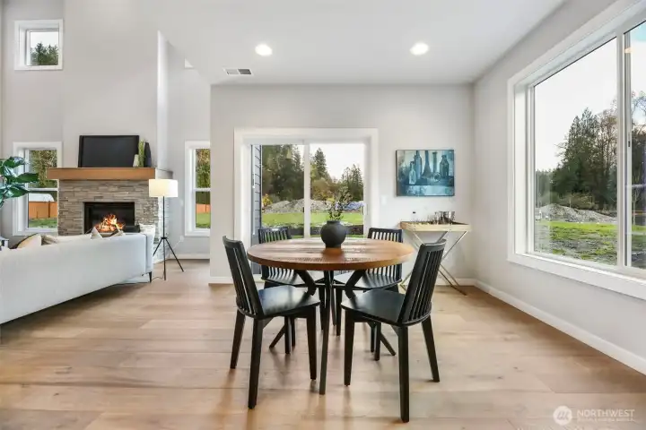 eating space off of the kitchen with sliding glass doors to the back yard