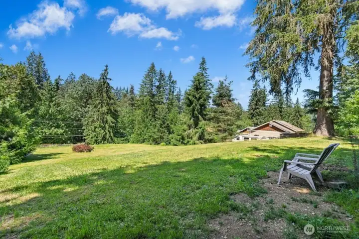 Acre+ lot has sweeping views. Acre+ lot has sweeping views.