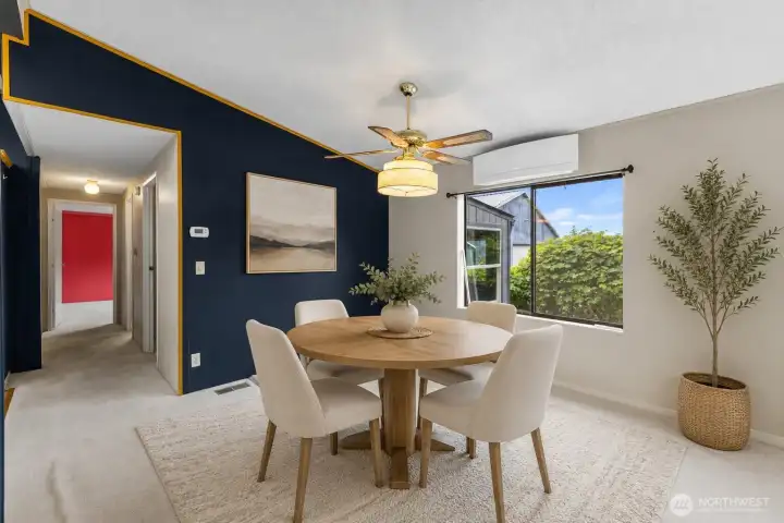 Dining area virtually staged. Peekaboee views of Puget Sound out that window.