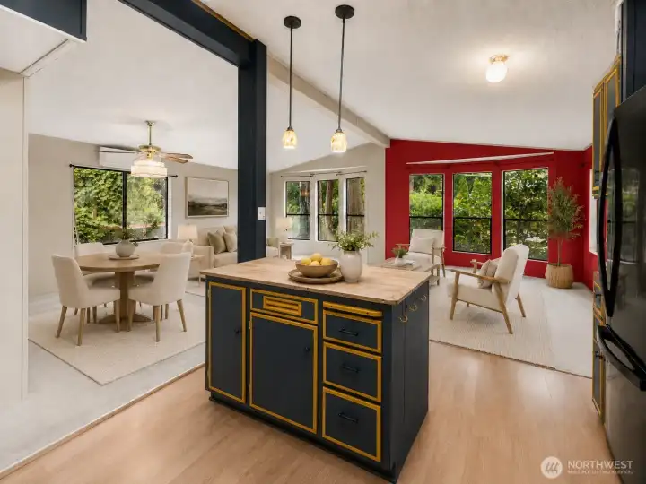 Looking at the dining room and living room from kitchen - virtually staged