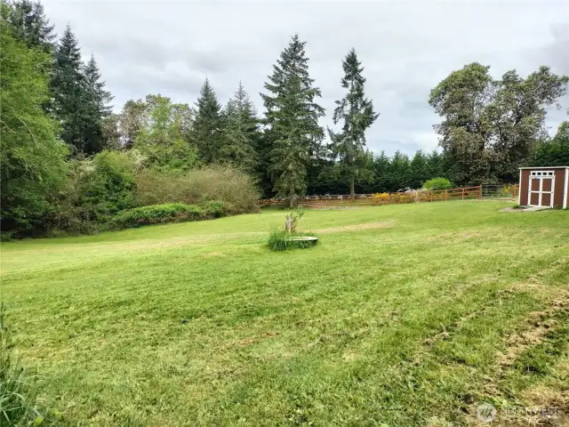 Super large horse fenced rolling front pasture. There is a cool walking trail on the Southside down near the fence.
