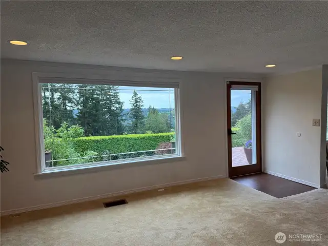 One of two large picture windows looking south to the peek view of Quartermaster Harbor.