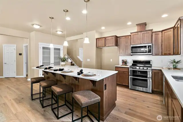 Home is under construction. Photos are of a previously built home from the same community with similar finishes that are staged. Builder reserves the right to change features, plans, prices & specifications without notice. Features vary by plan. Buyer to verify square footage.
