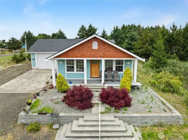 Front view of home showing terraced landscaping