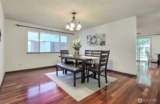 Formal Dining Room.  To the right is the family room and sliding door to the back yard.