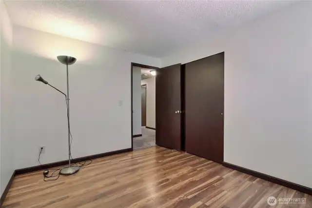 Bedroom #3 with new laminate flooring.