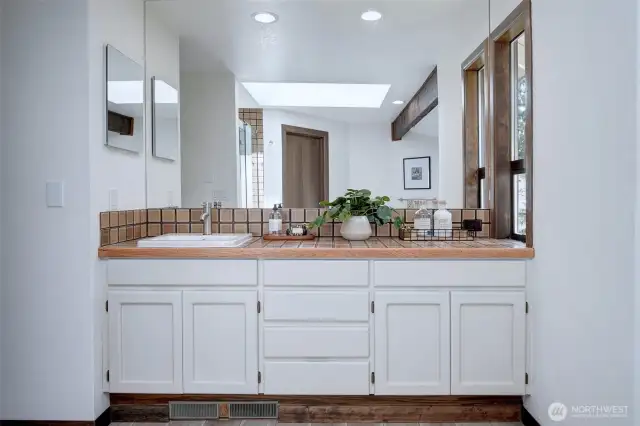 Great Vanity space with plenty of counter to get ready in the morning