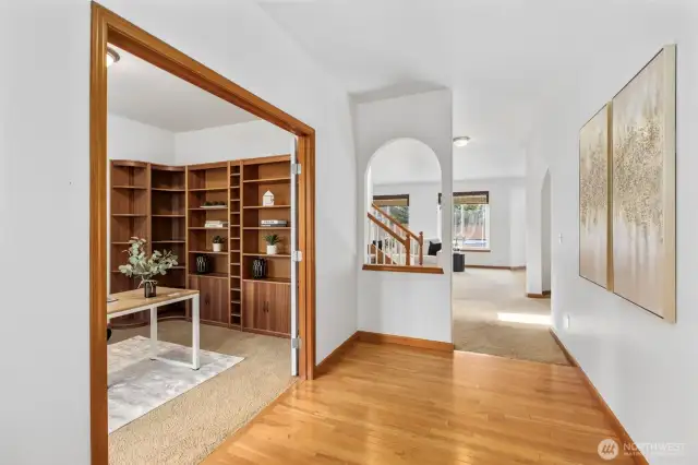 Entryway leads to office with French doors