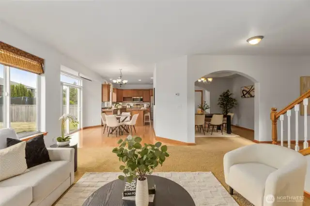 Living area opens to kitchen and dining area