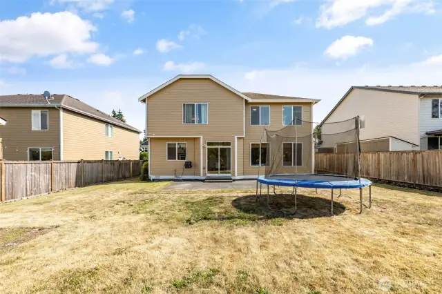 Large backyard- trampoline included in sale!