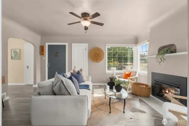 Living Room with original charm, and electric fireplace