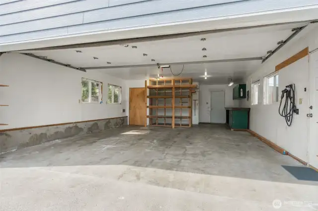 Detached 2-Car Garage has EV charger, plus a loft above!