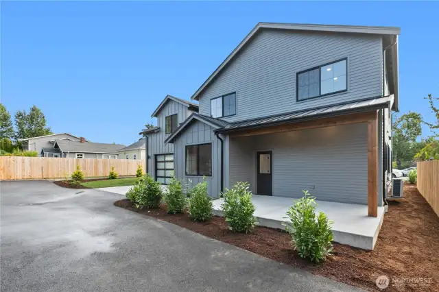 New, solid construction with metal roof & covered porch