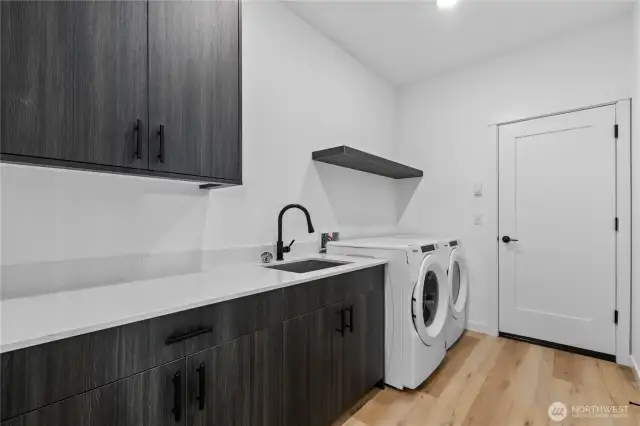 Laundry room complete with washer & dryer