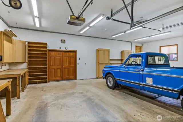 Workbenches, power, plenty of room.  The French doors lead to the office space.