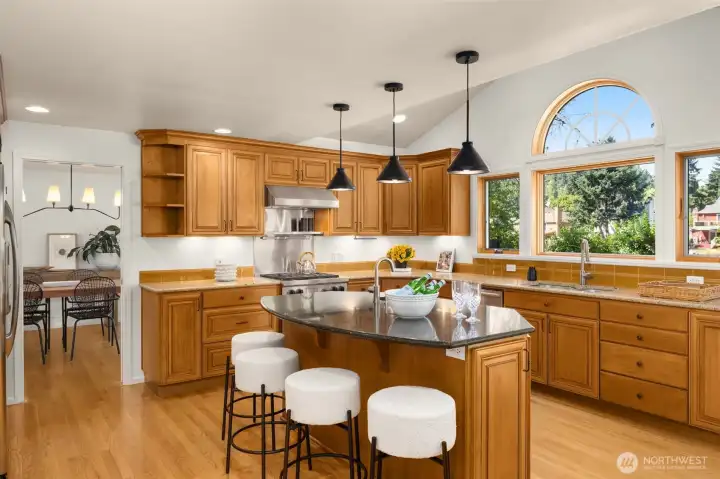 The heart of the home combines abundant natural light with generous space for hosting family and friends.