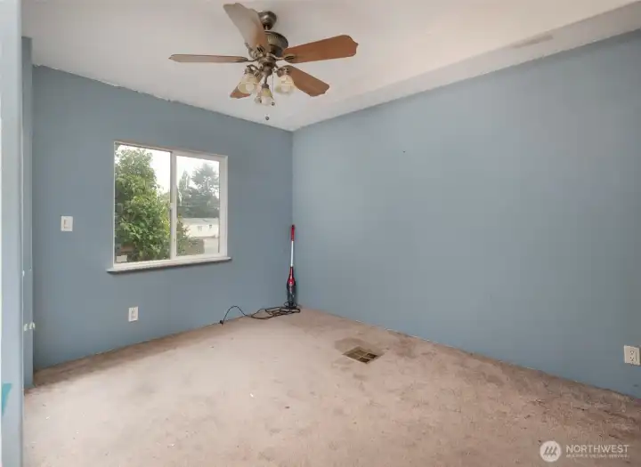 Dining room with window looking out toward front yard.