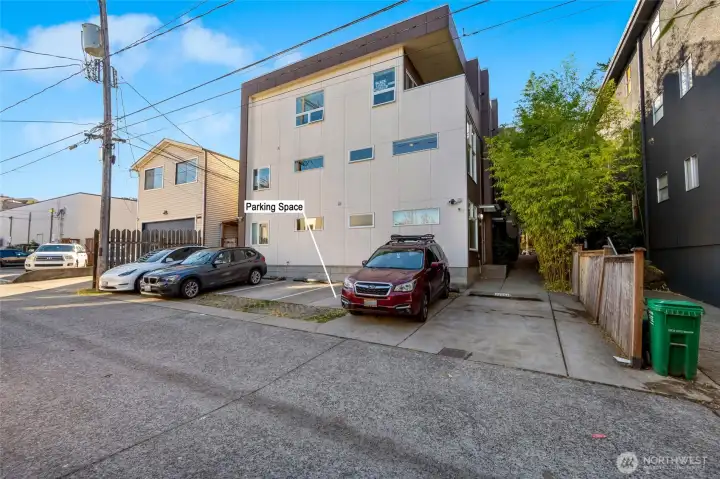 Parking space on the back side of the building with easy access to the unit