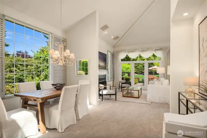 Dramatic soaring vaulted ceilings in dining & living