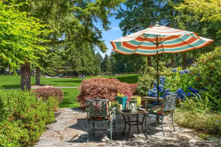 Patio off the living room with golf course views!