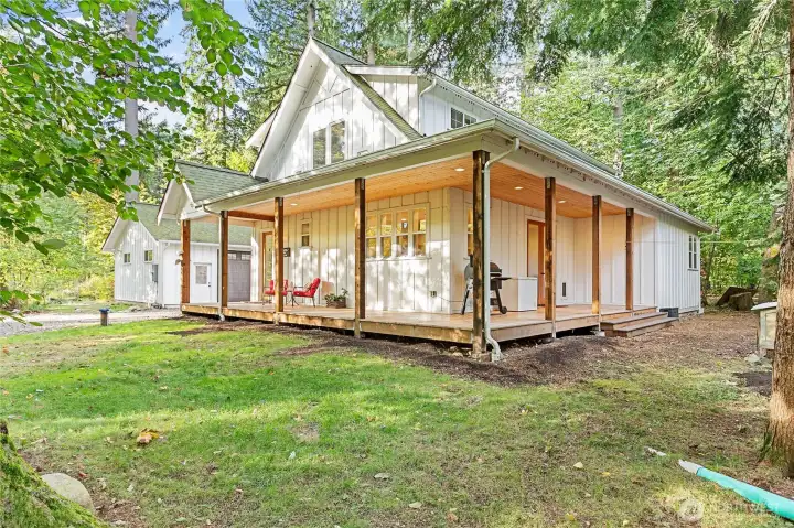 Expansive wrap-around porch for relaxing or entertaining.