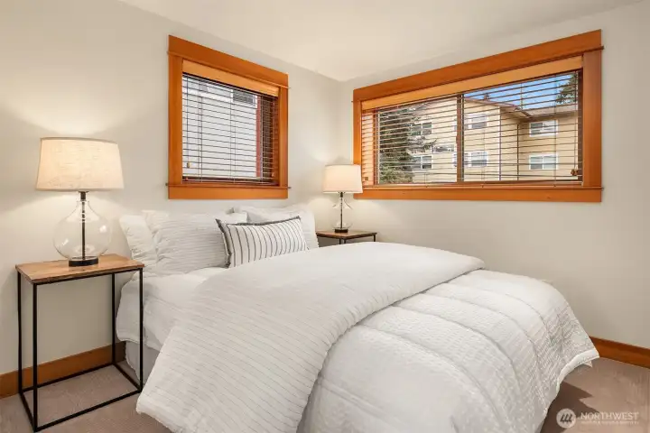 Comfortable second bedroom on the upper floor.