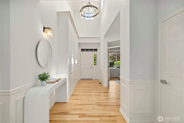 A gracious grand entrance invites you in with warmth, light, and sophistication.