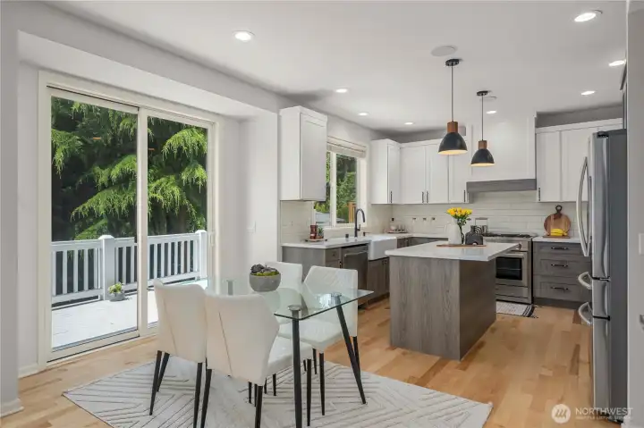 A charming breakfast nook sits just off the kitchen